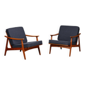 Pair Scandinavian Modern armchairs in teak and dark blue bouclé fabric