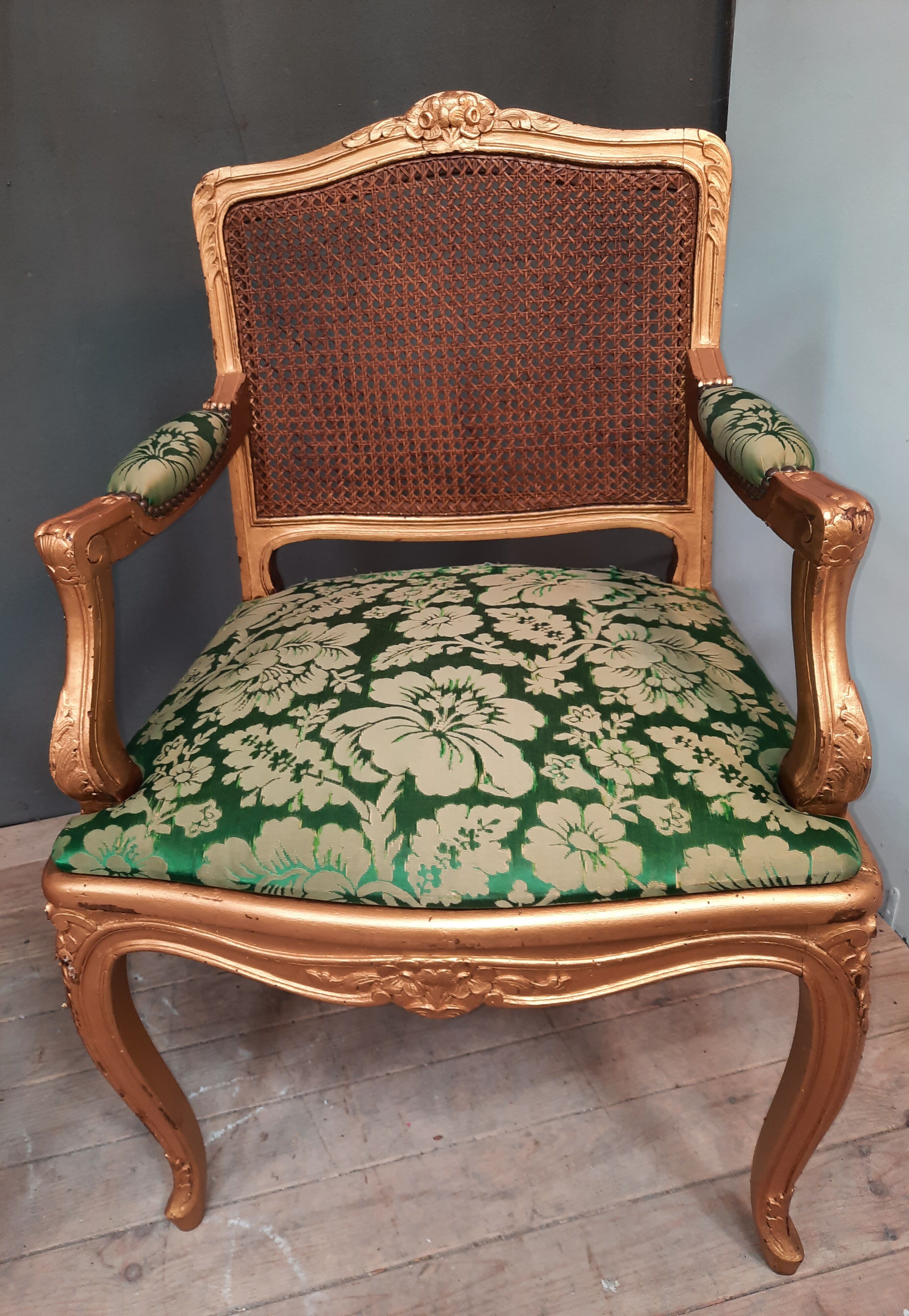 Louis XV-style golden armchair pair