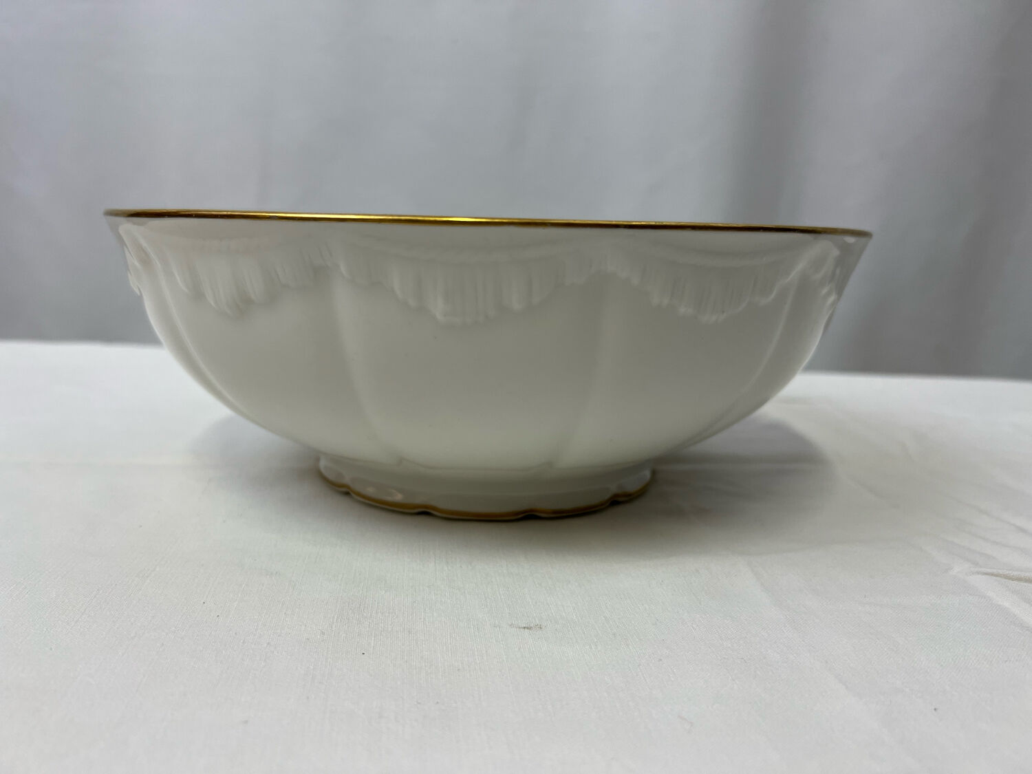 White and golden salad bowl