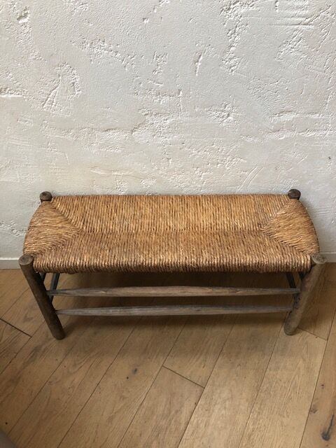 Wooden and straw bench