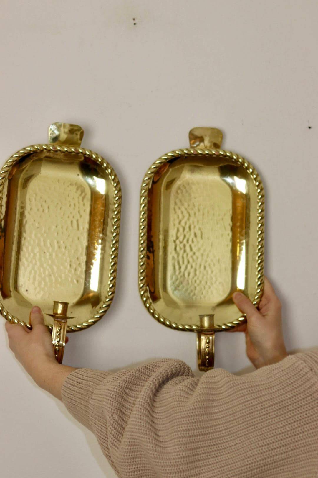 Pair of Swedish brass wall sconces from the mid-century.