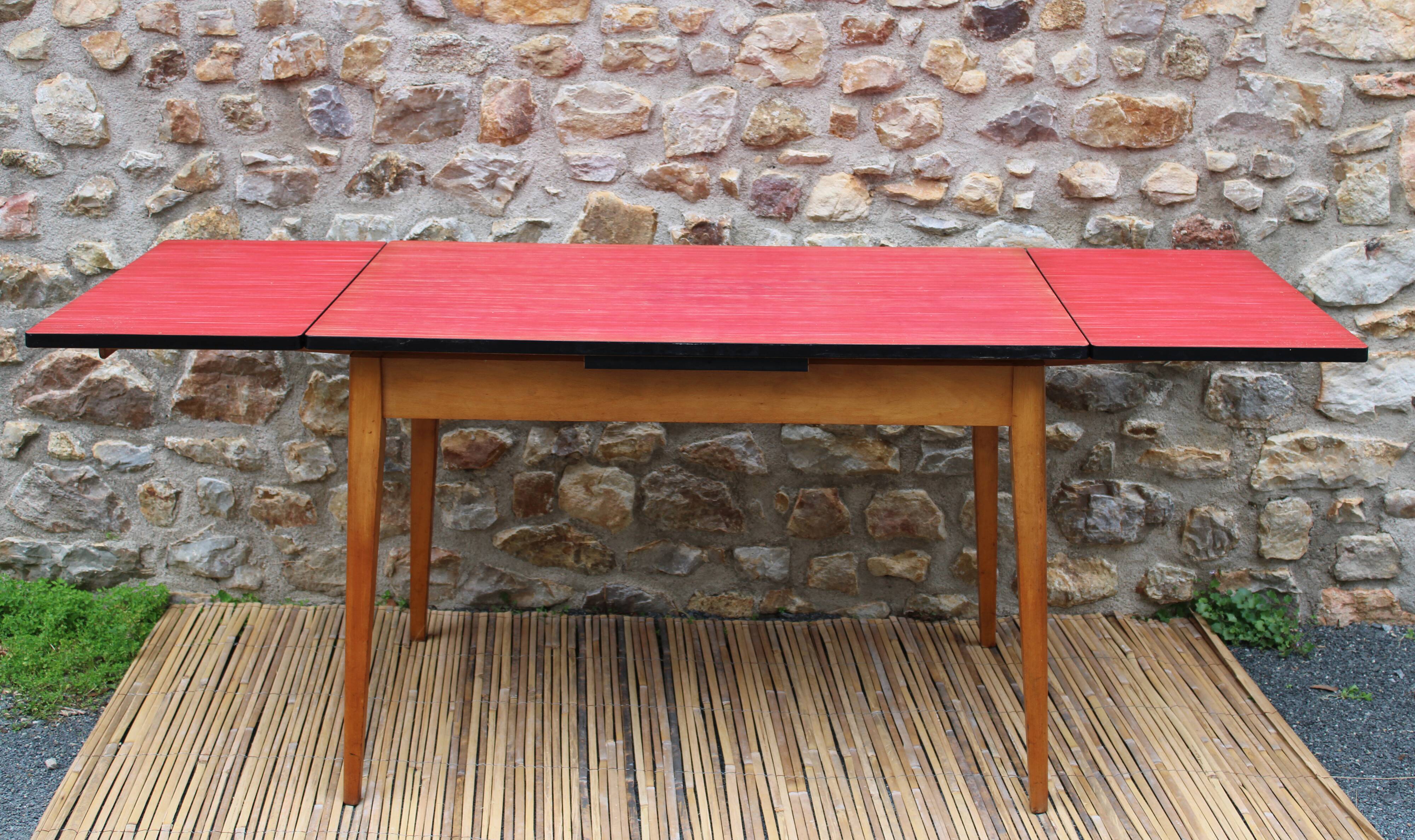Extendable wooden and formica table