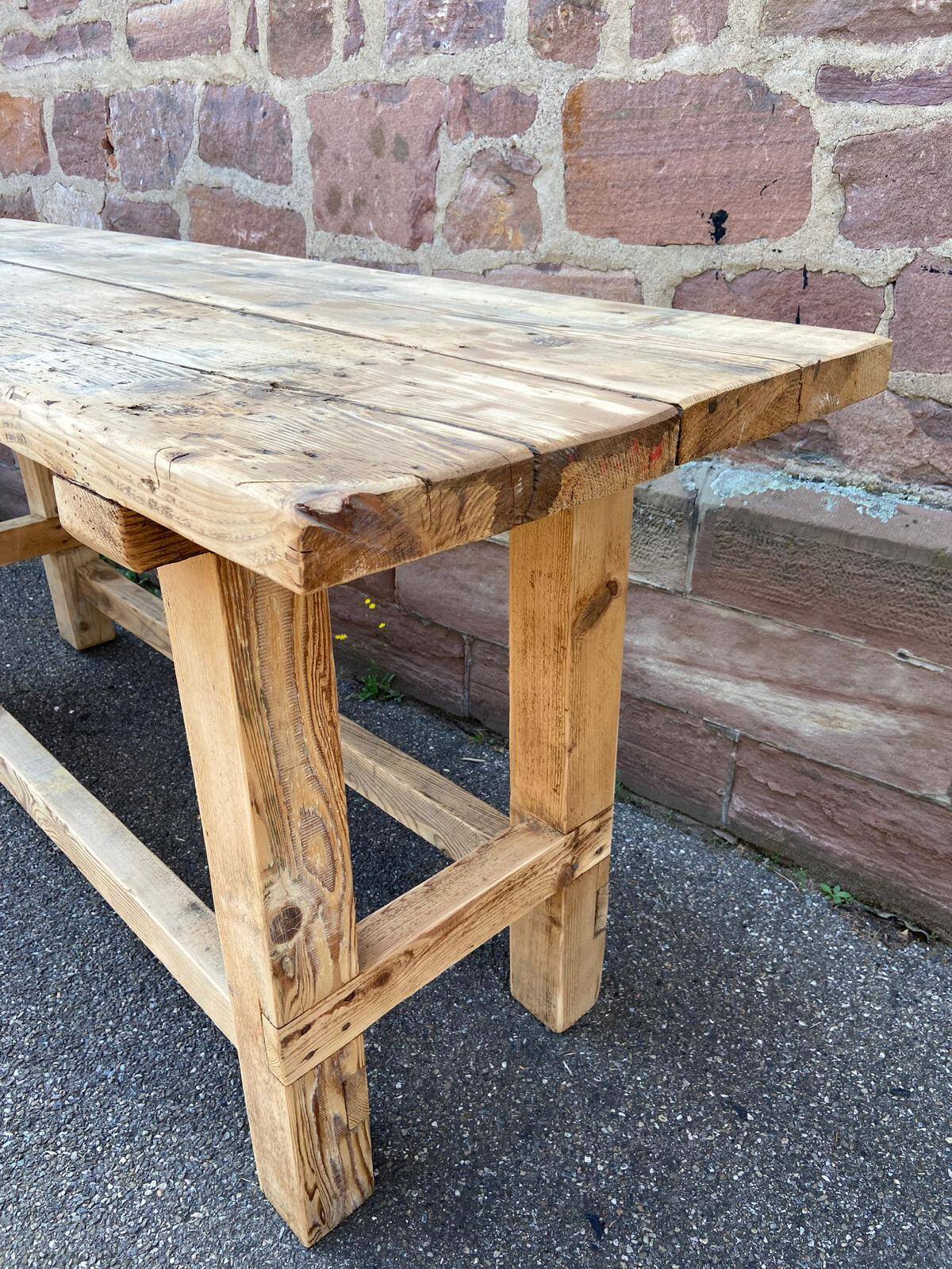 Primitive industrial table workbench in raw natural wood vintage bohemian trade store