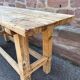 Primitive industrial table workbench in raw natural wood vintage bohemian trade store