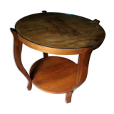 Round lounge table in blond wood