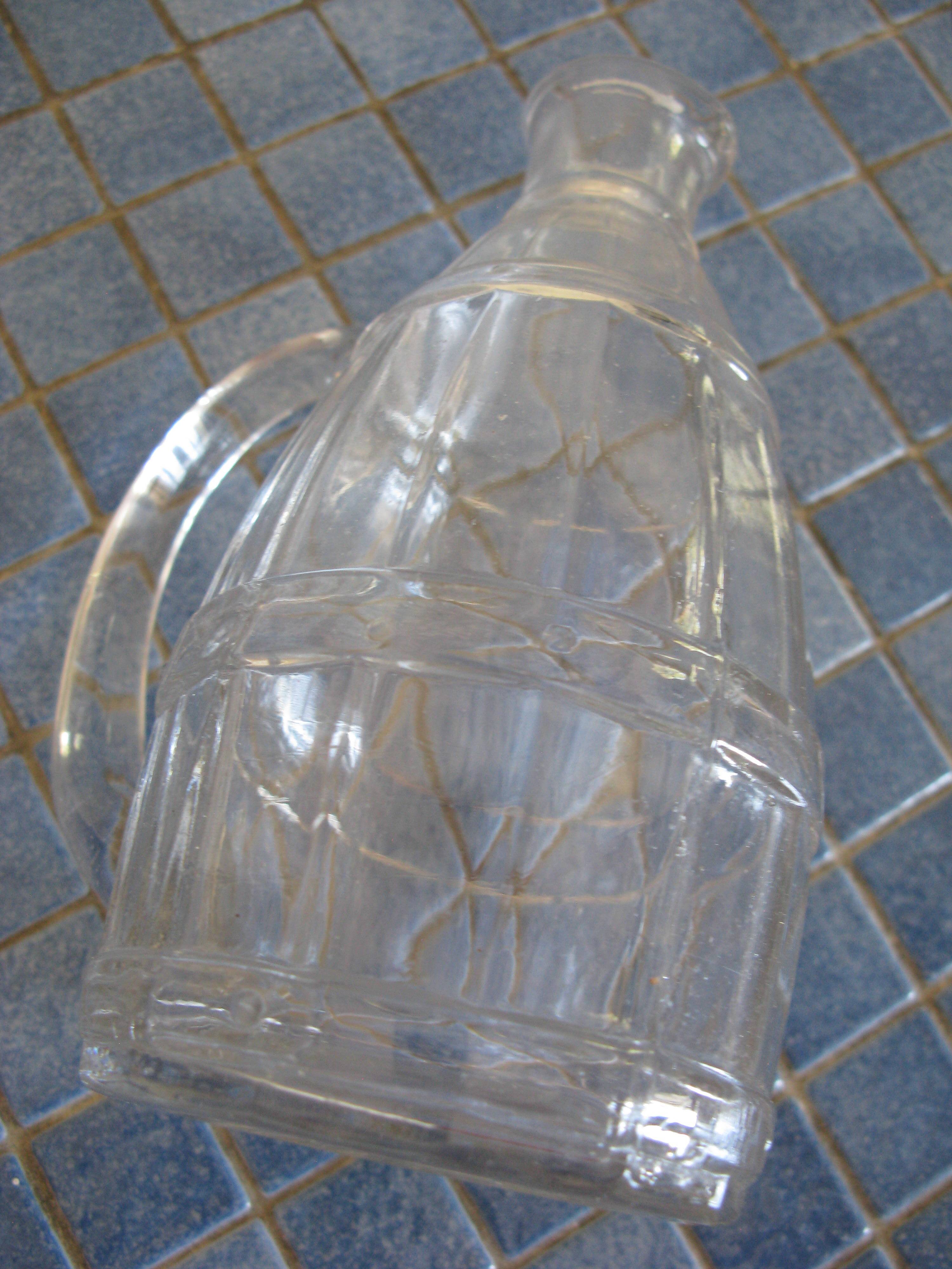 Lot de 4 carafes en verre blanc