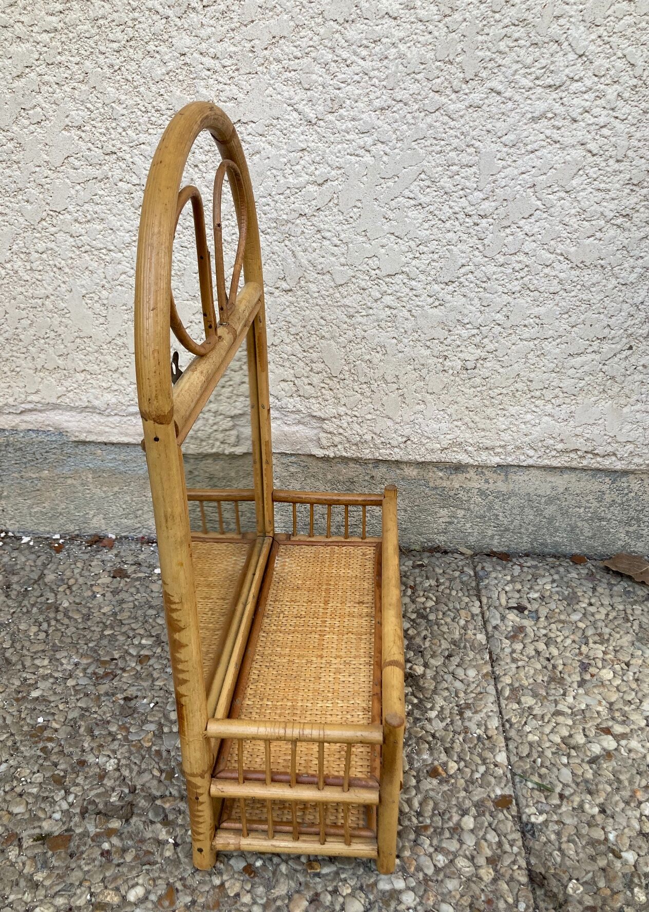 Vintage rattan wall shelf with mirror