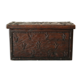 Carved wooden chest with bas-reliefs, artisanal, 20th century.