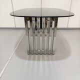 Chrome base diningroom table with smoked glass oval top