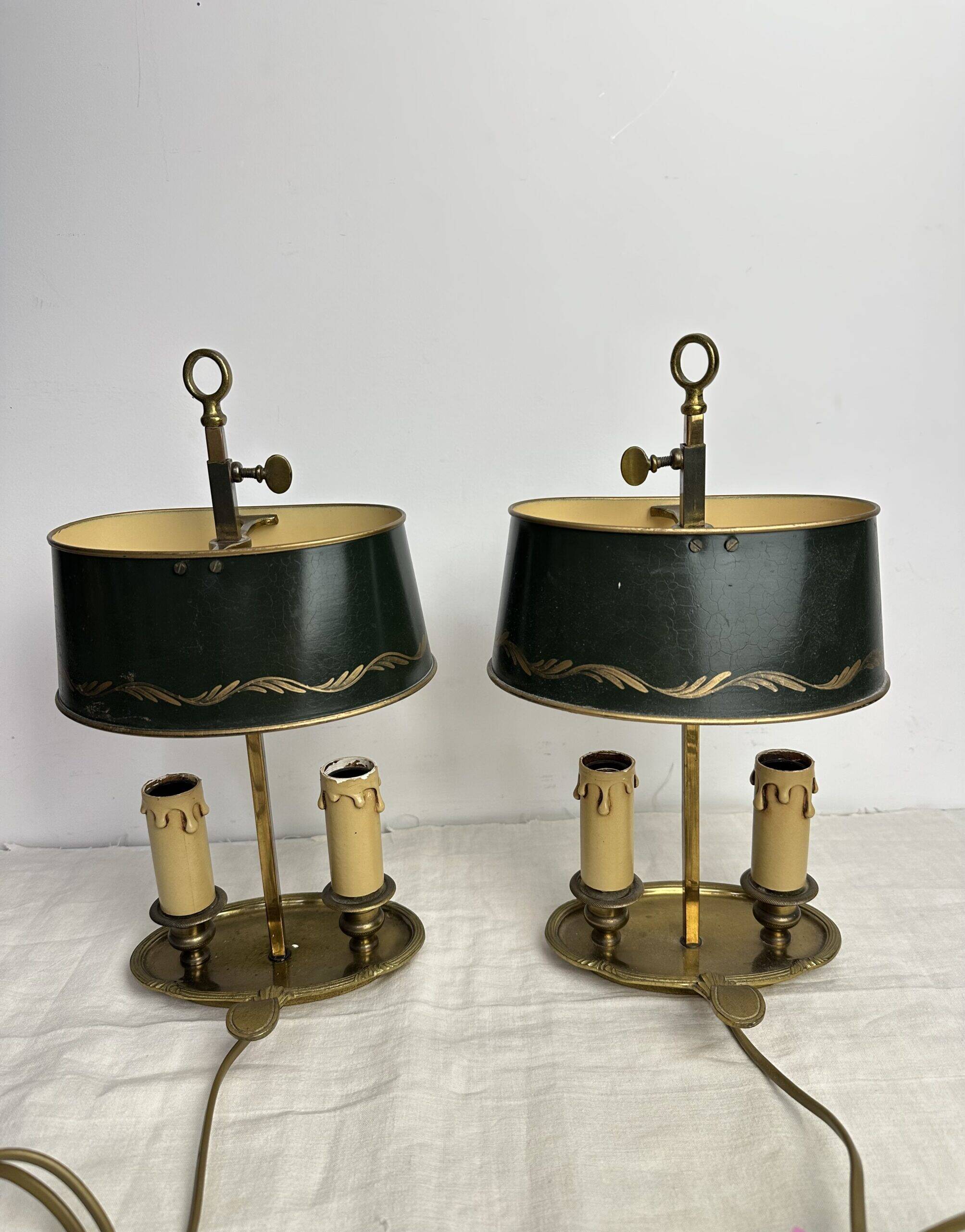 A pair of old brass bed warmers.
