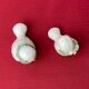 Pair of miniature white birds in ancient ceramics