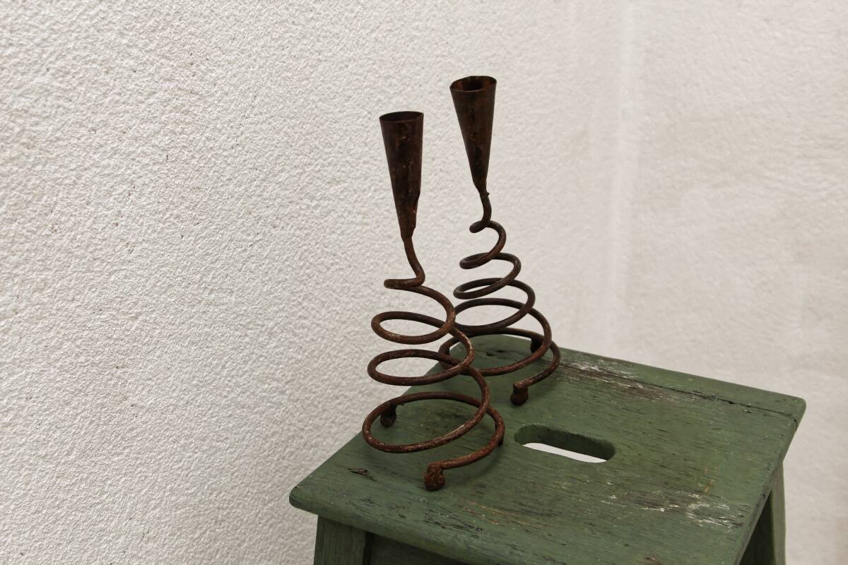 Pair of wrought iron spiral candlesticks