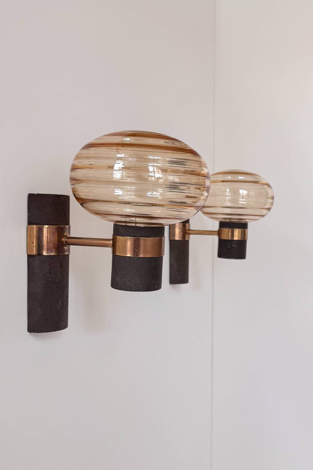 Pair of vintage wall lights, brass and amber glass, France, 1970.