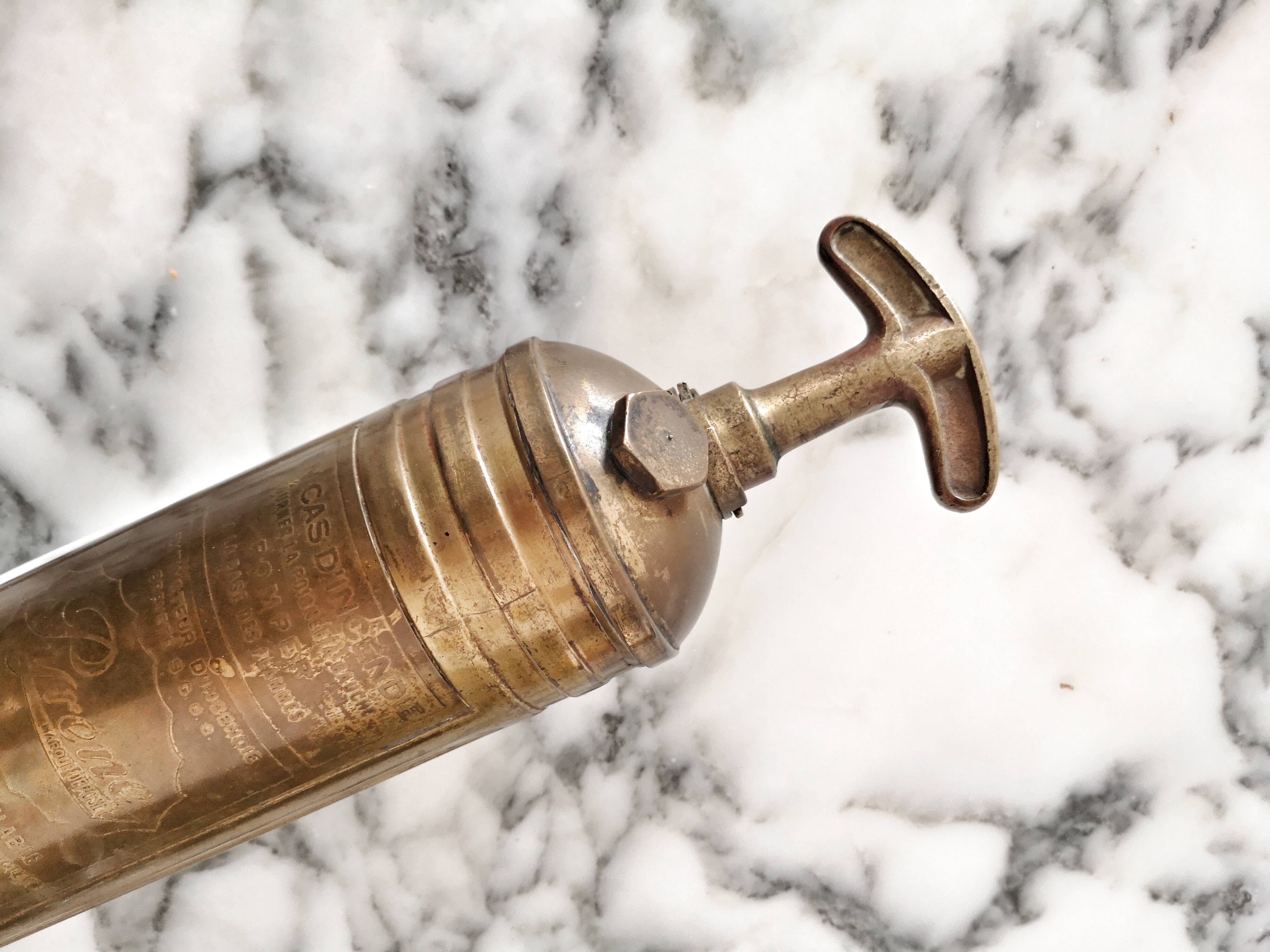 Pyrene, brass fire extinguisher for automobile