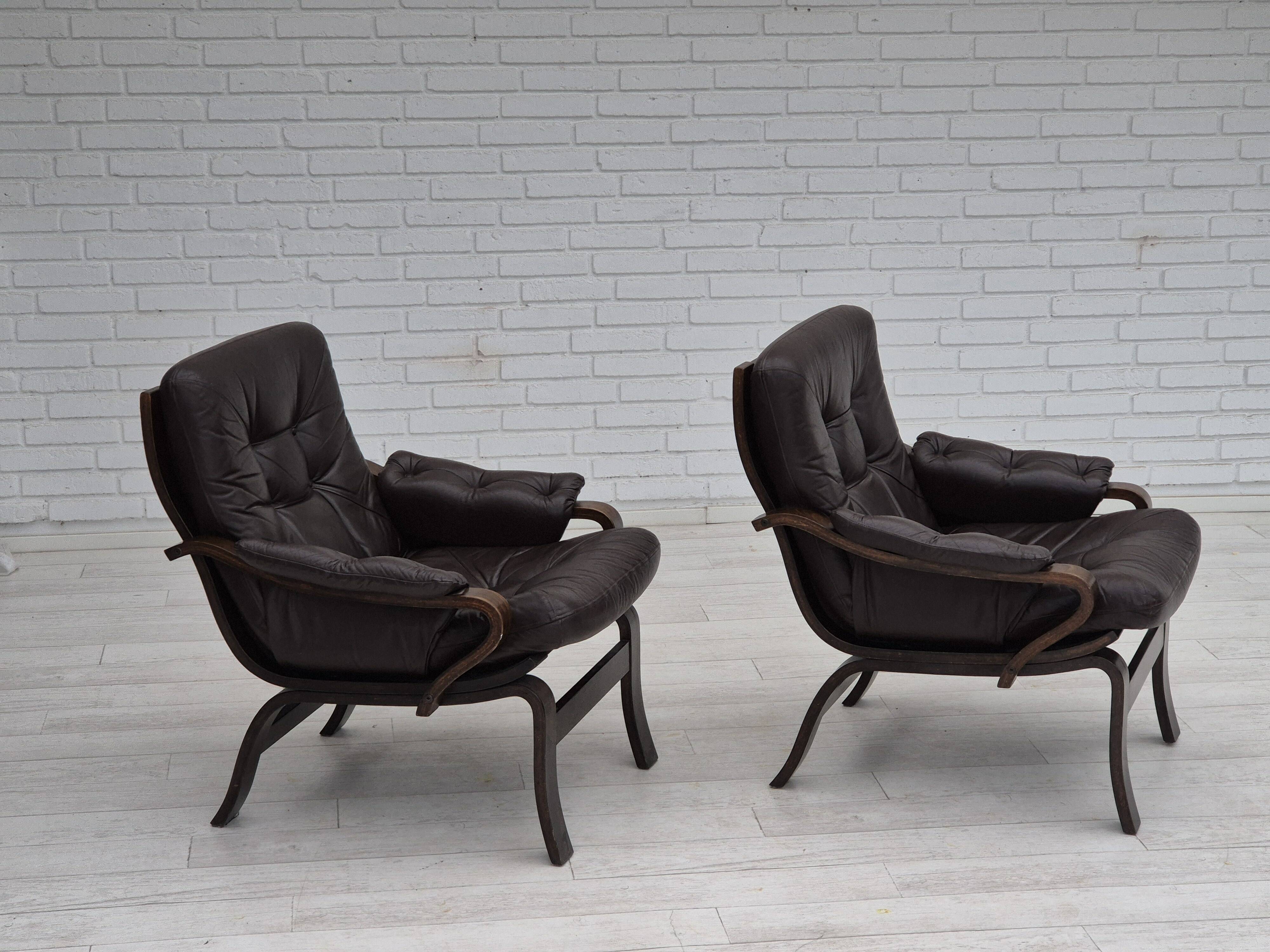 1970s, Scandinavian lounge chair in original condition, brown leather, dark bent wood.