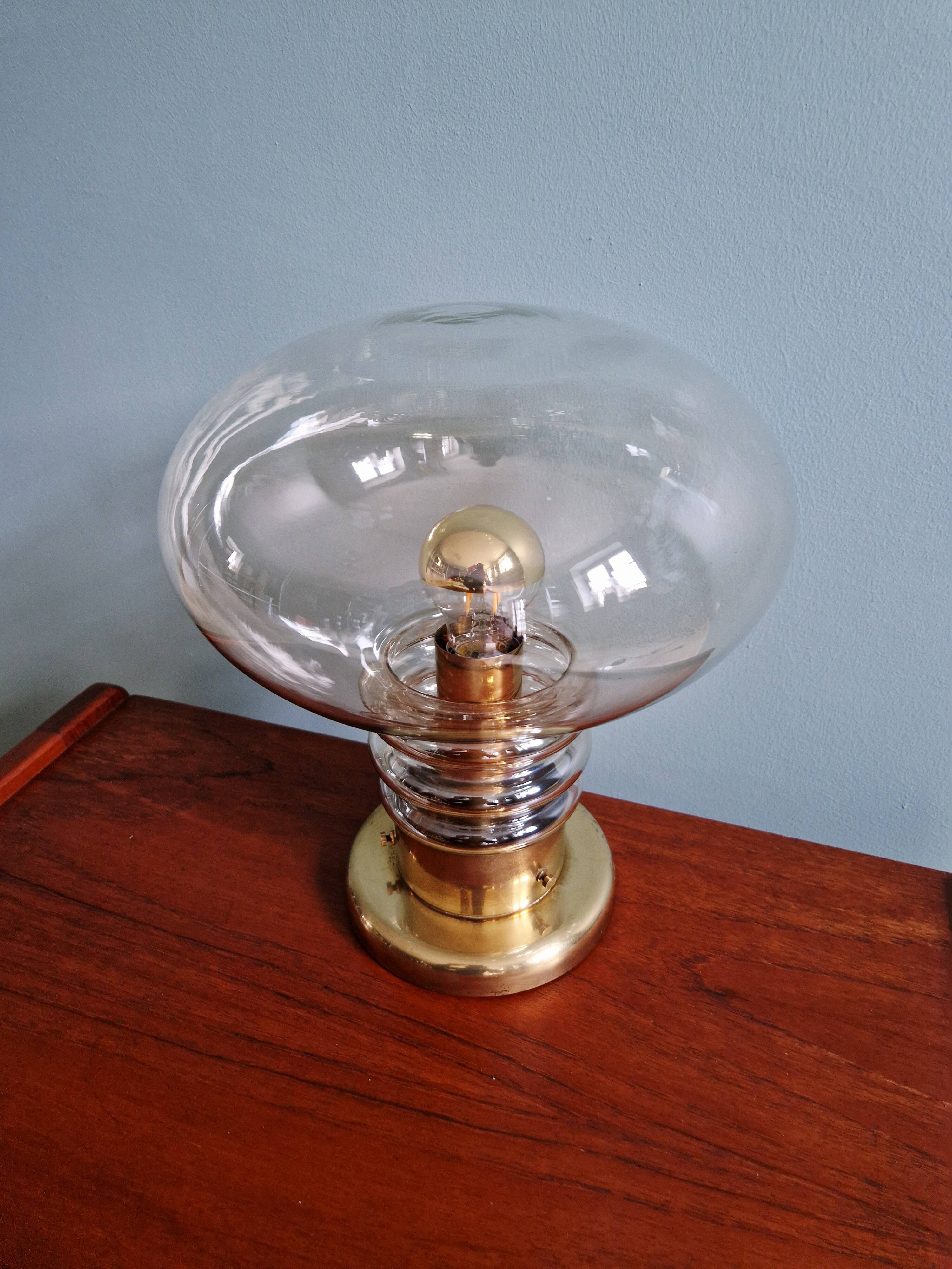 Space Age table lamp in brass and clear glass, 1960s-70s.