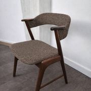 Rosewood and wool chair, model 32 by Kai Kristiansen for Korup Stolefabrik, Denmark, 1960.
