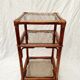 Rattan and smoked glass side table