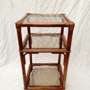 Rattan and smoked glass side table