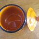 Sugar pot in orange enamelled sandstone