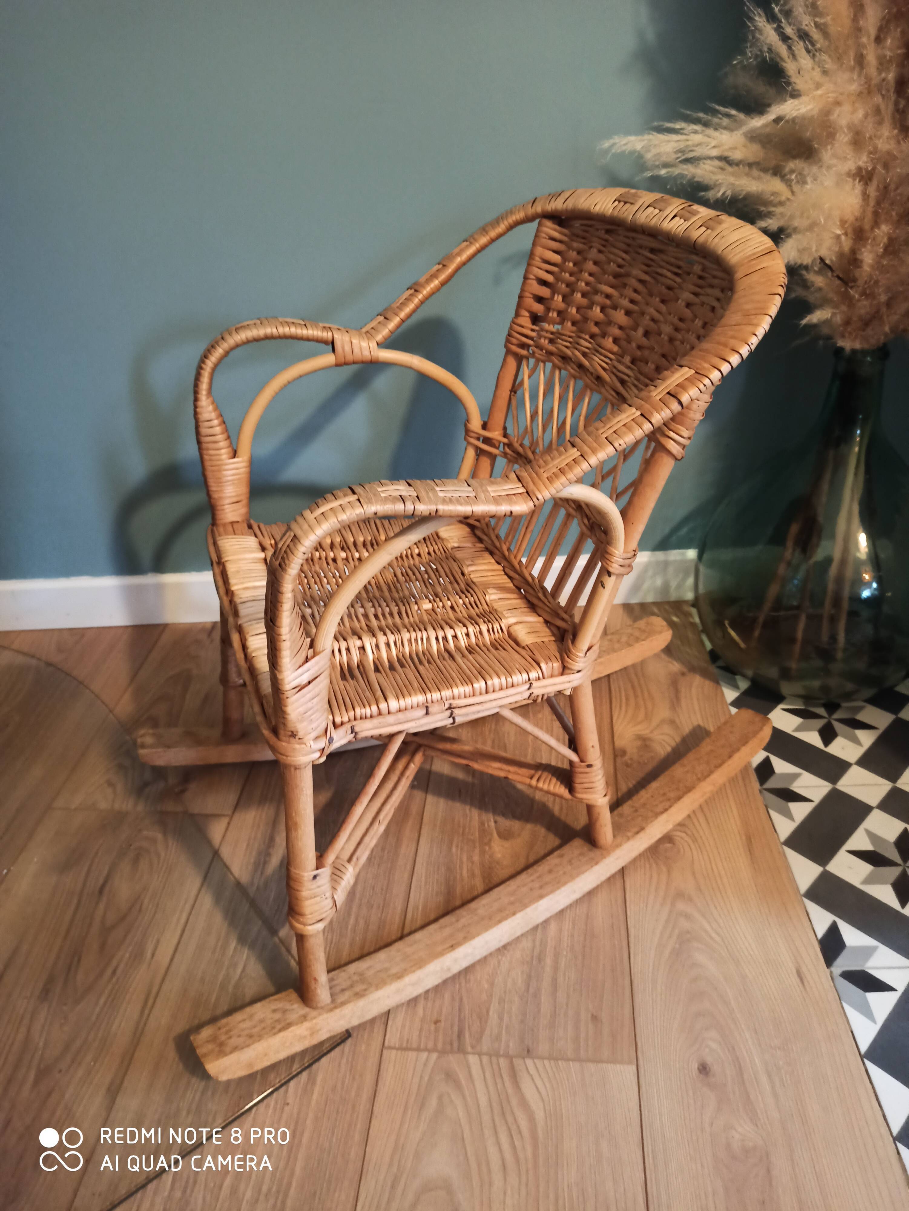 Vintage rattan children's rocking chair