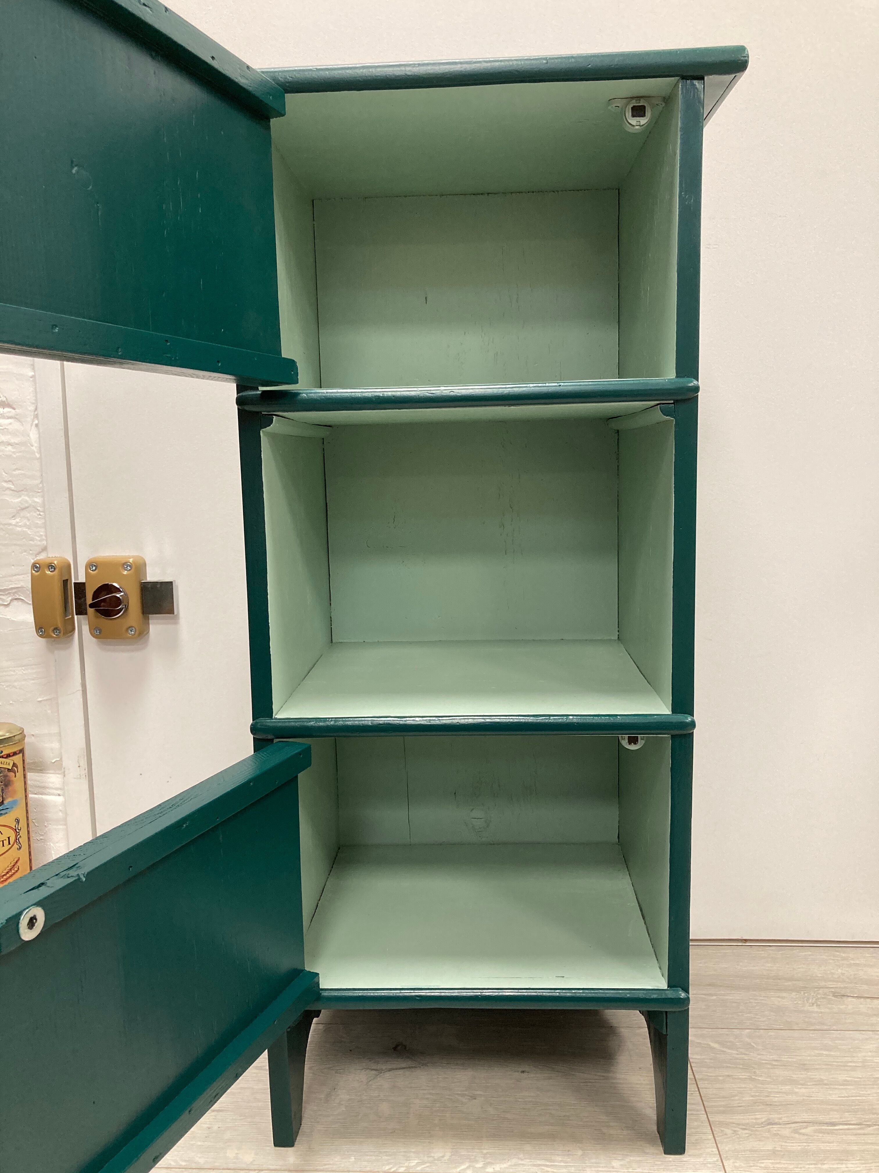 Two-door green bedside table