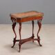 Small antique coffee table made of fruitwood and rosewood, 20th century.