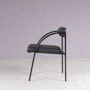 1980s “Tokio” dining table with six “Vienna” chairs by Rodney Kinsman for Bieffeplast, Italy