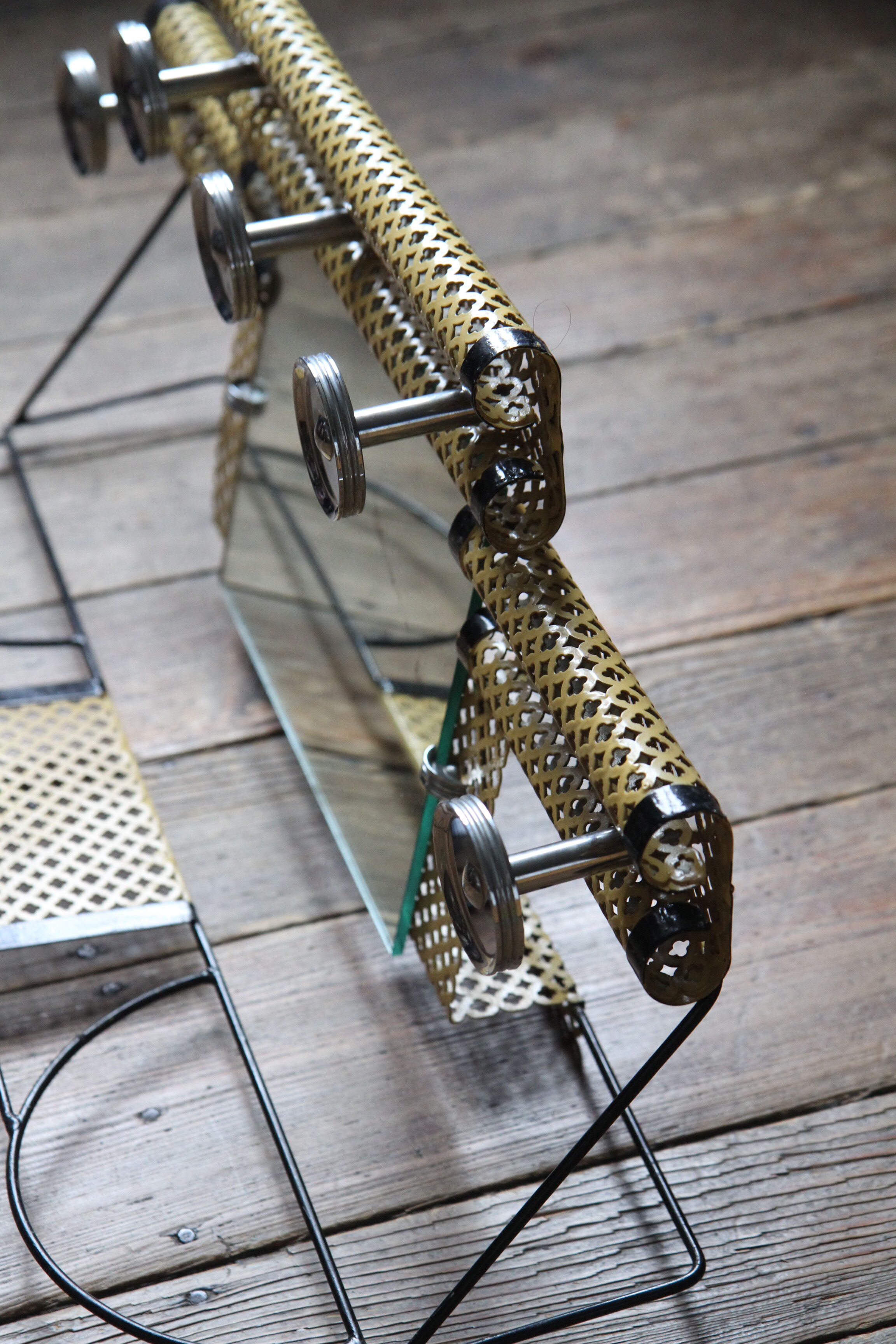 1950s perforated metal coat holder