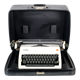 Machine a écrire Olympia avec valise