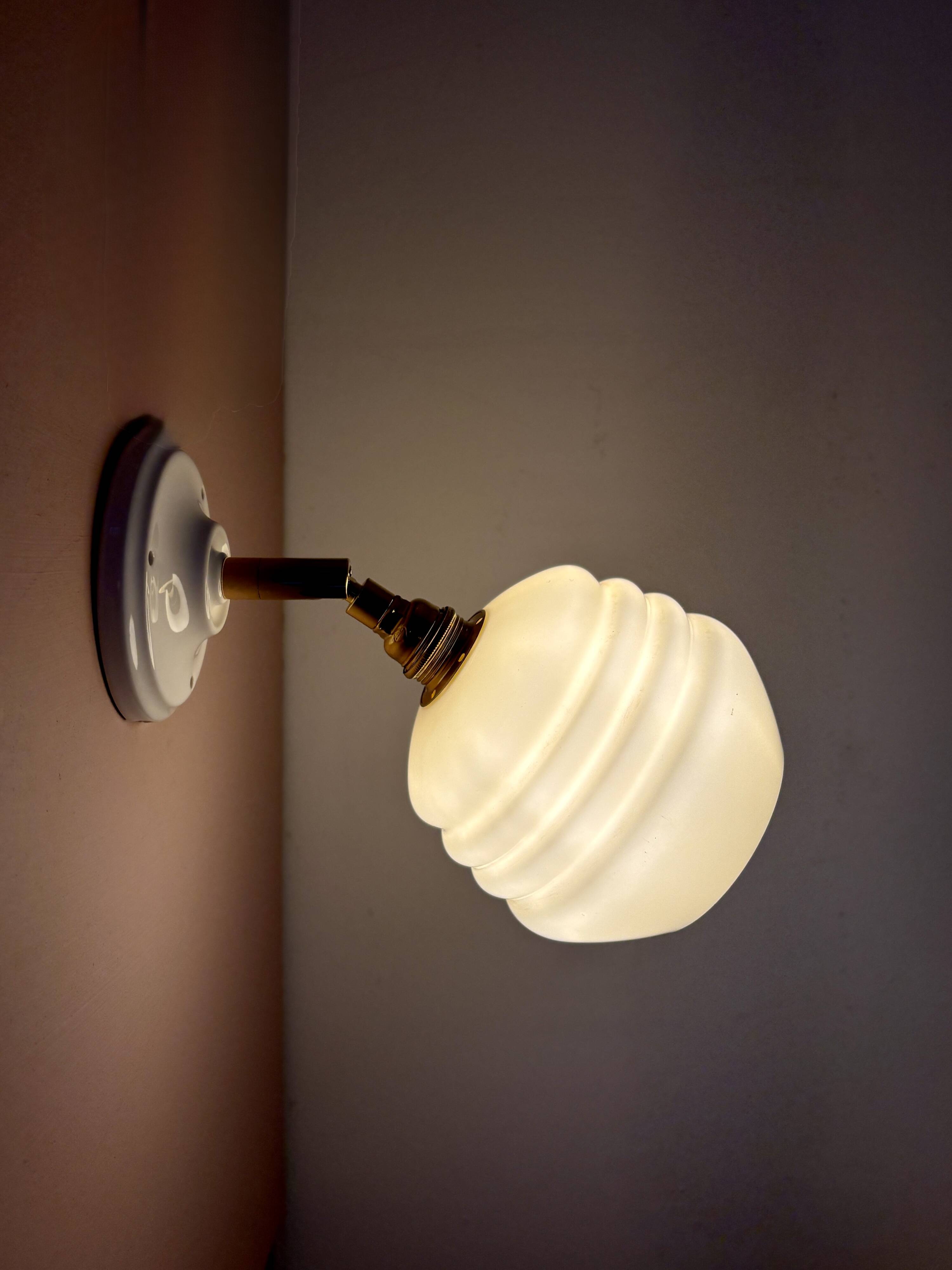 Vintage globe wall lamp in pale yellow opaline