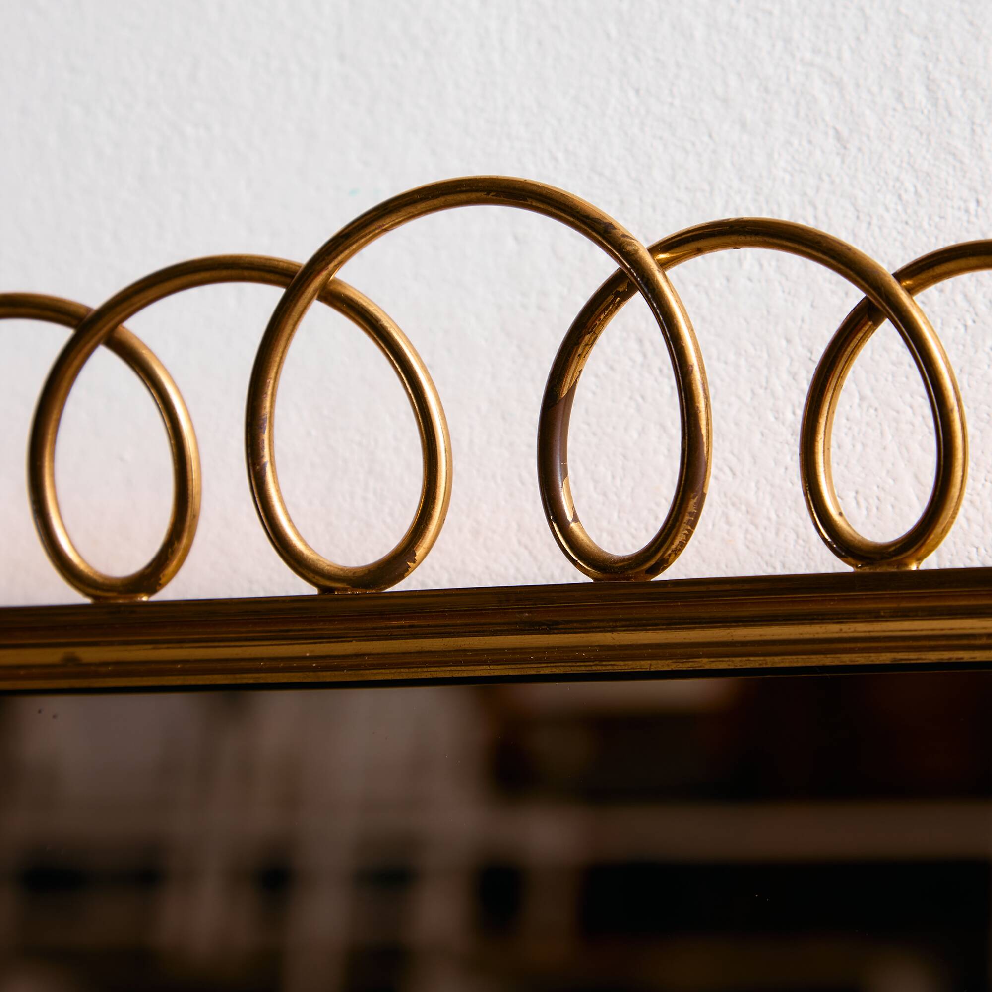 Metal and brass framed mirror