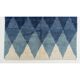 Tapis en laine contemporain avec des diamants bleus entrelacés.