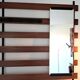 Vintage teak wall coat rack with 5 hooks and mirror.