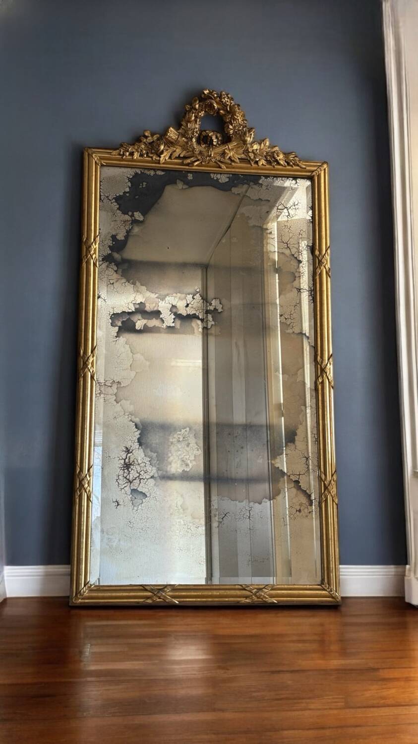 Large Louis XVI style gilded mirror, 19th century