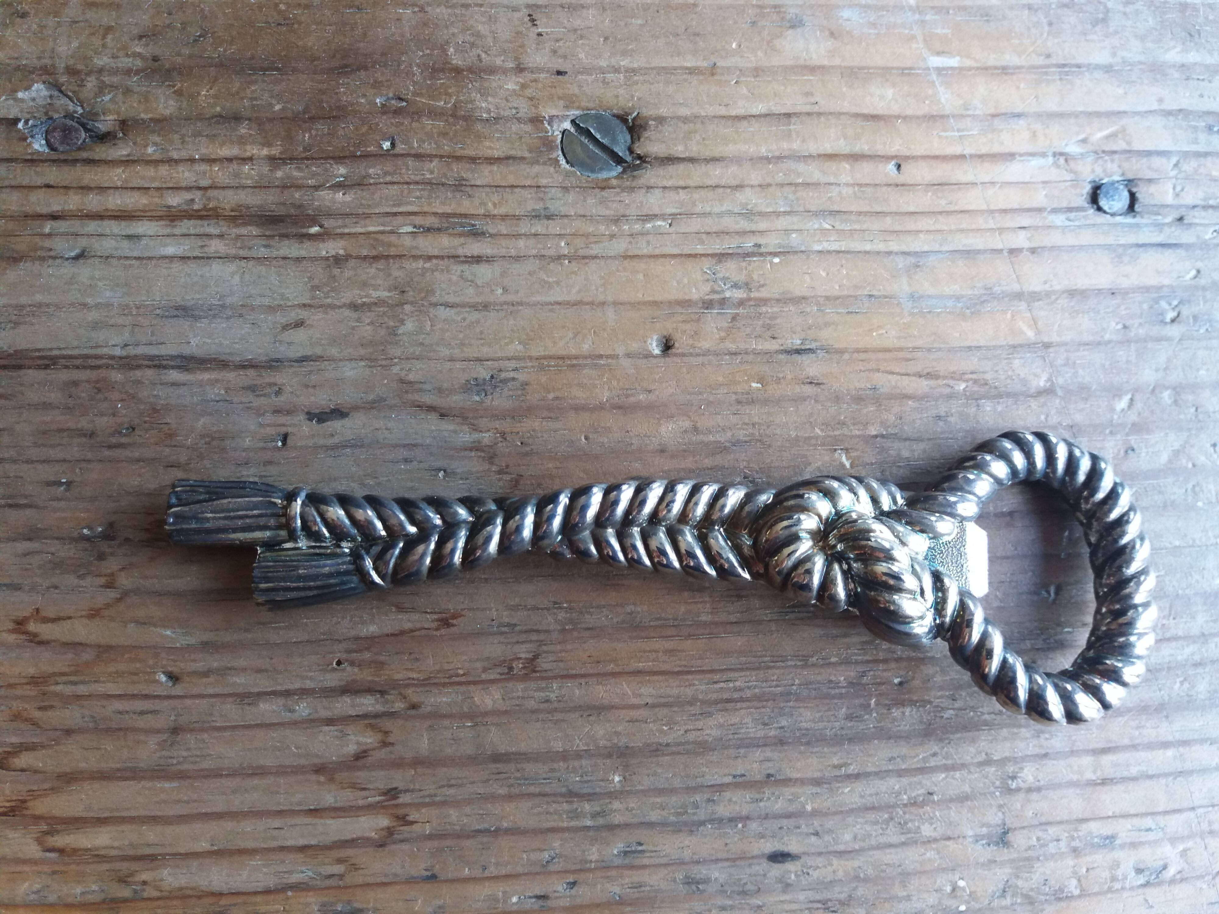 Silver metal rope bottle opener