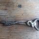 Silver metal rope bottle opener