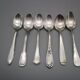 Set of 6 small mismatched old silver metal spoons for a chic table