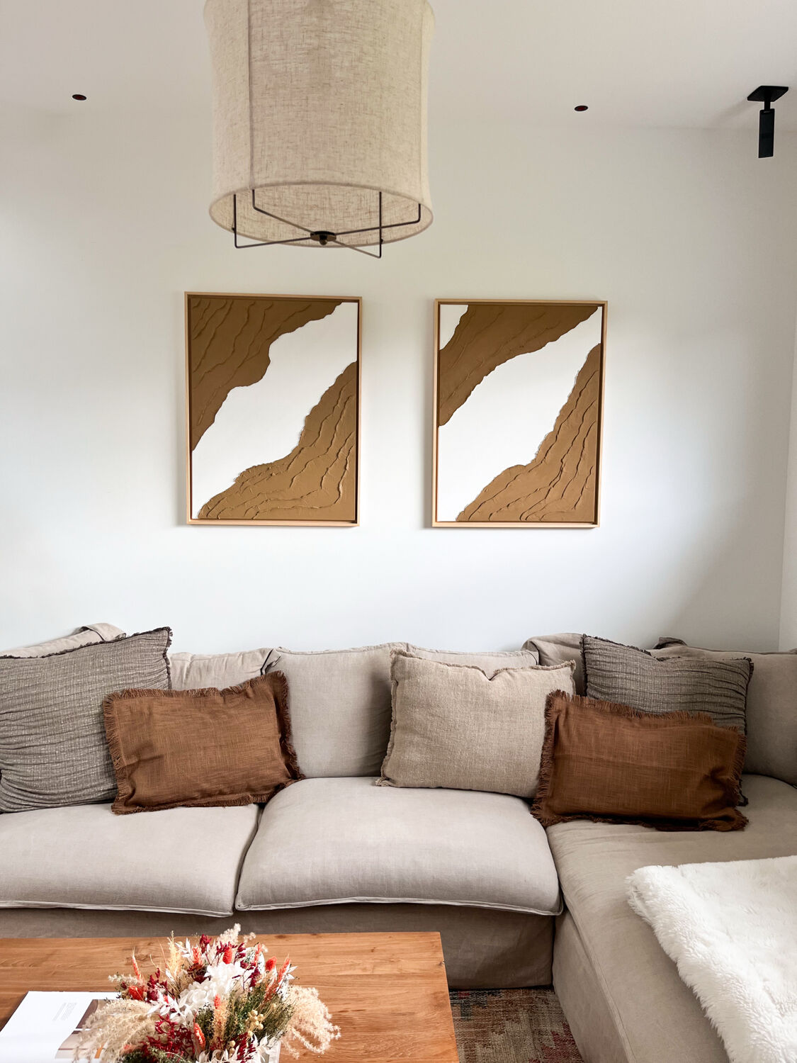 Brown and white relief diptych panels