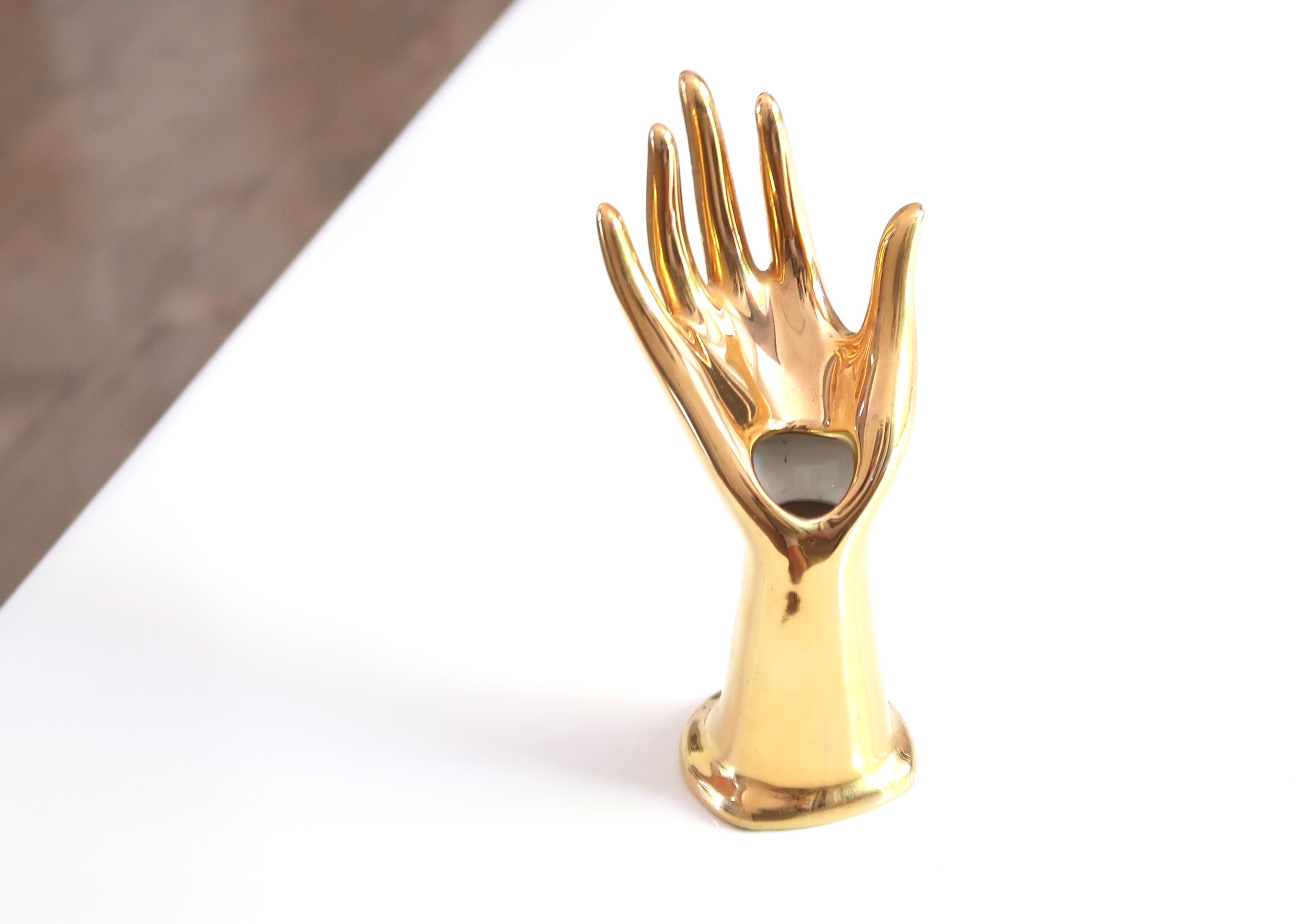 Golden porcelain fig hand, 70s