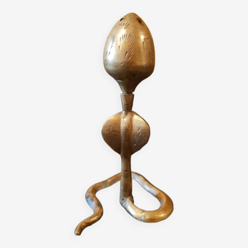 Copper “cobra” incense stick.
