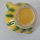 Jug melon in yellow and green majolica