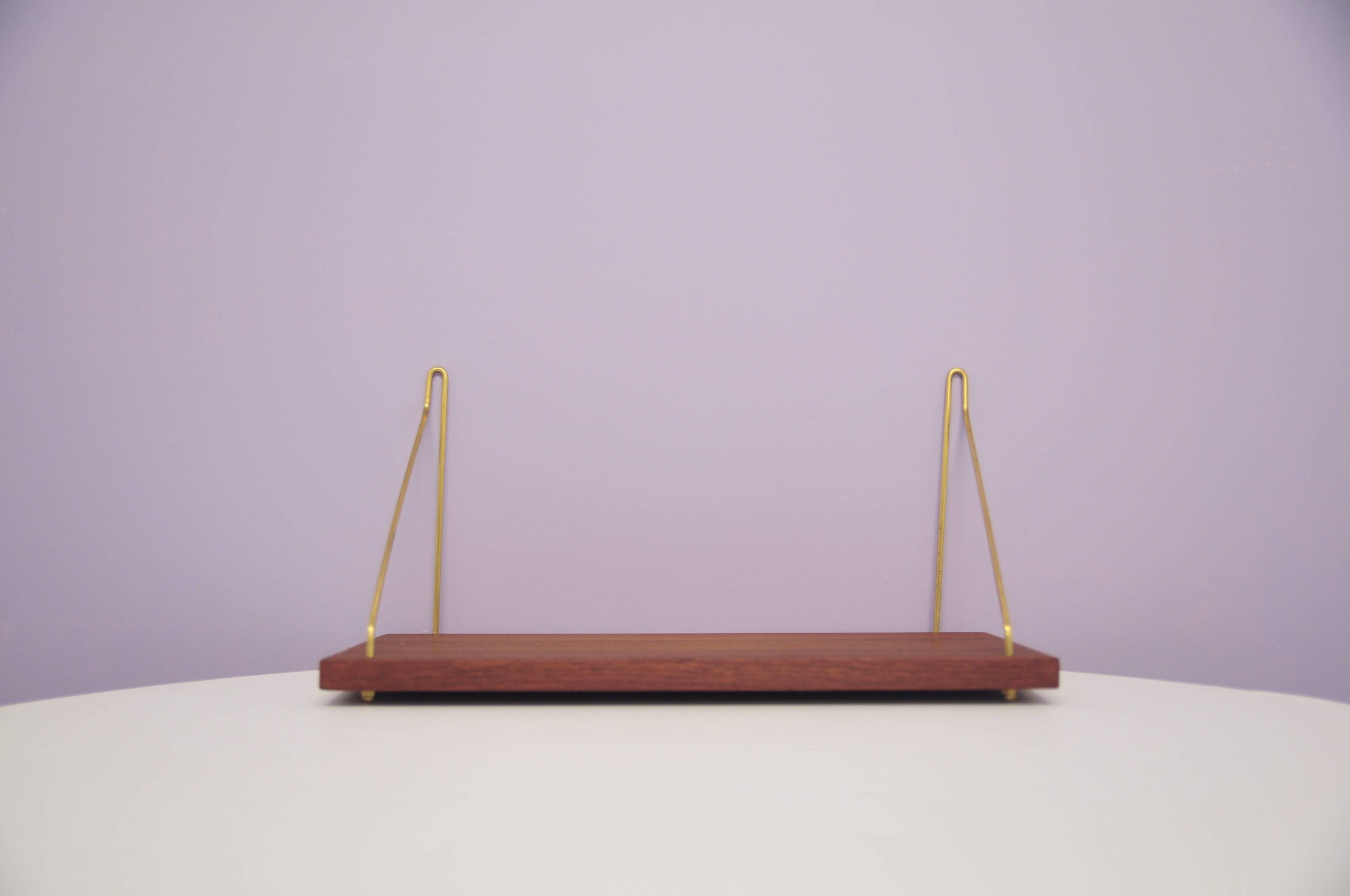 Danish vintage teak wall shelf brass supports
