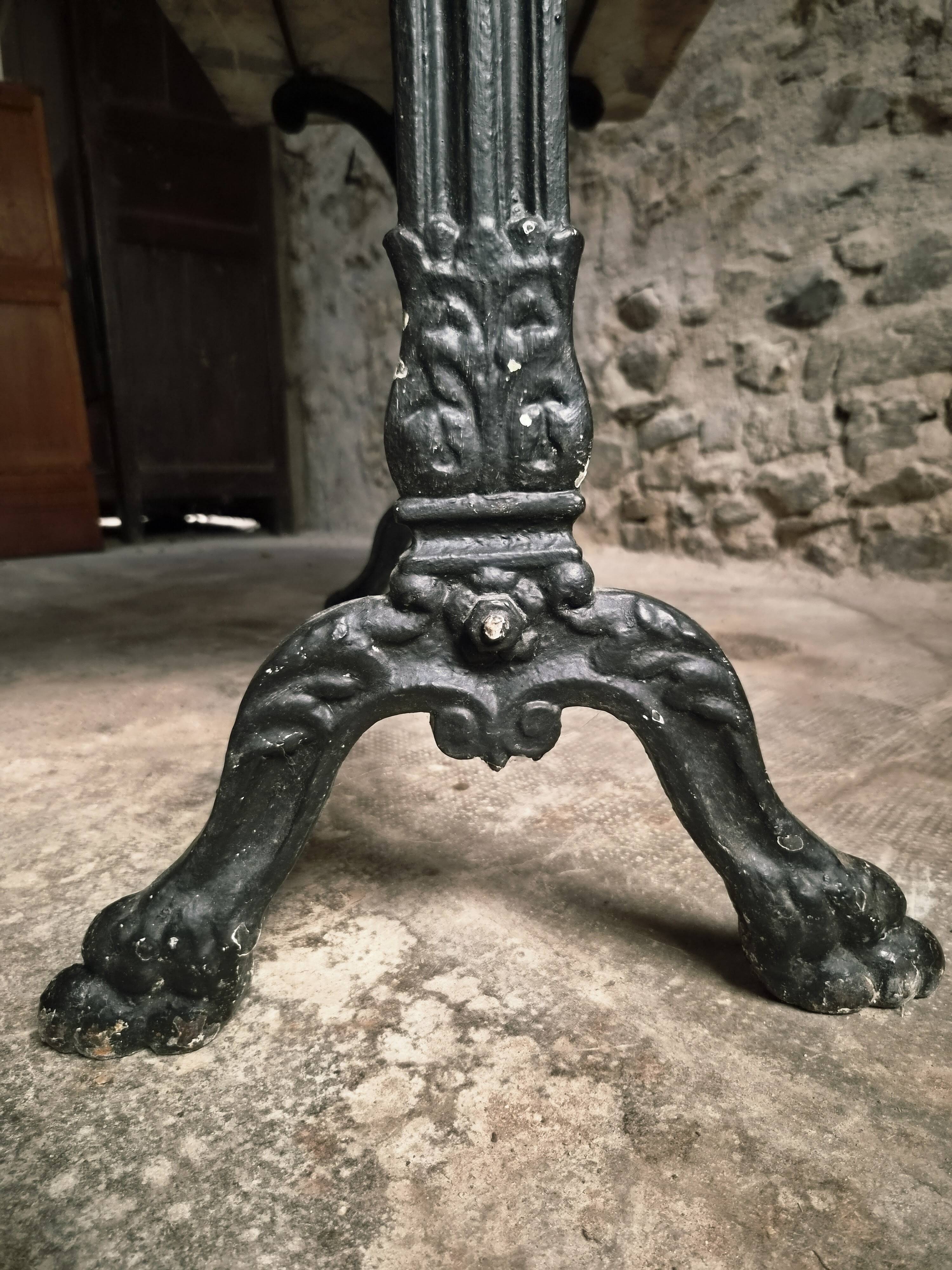 French bistro table made of marble with a cast iron base, 1920s–1930s.