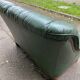 Vintage 2-seater sofa in green leather and solid wood