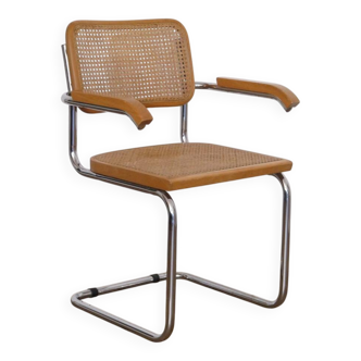 Cesca armchair in wood, metal, and cane from the 1970s.