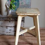 Old workshop stool in patinated solid wood