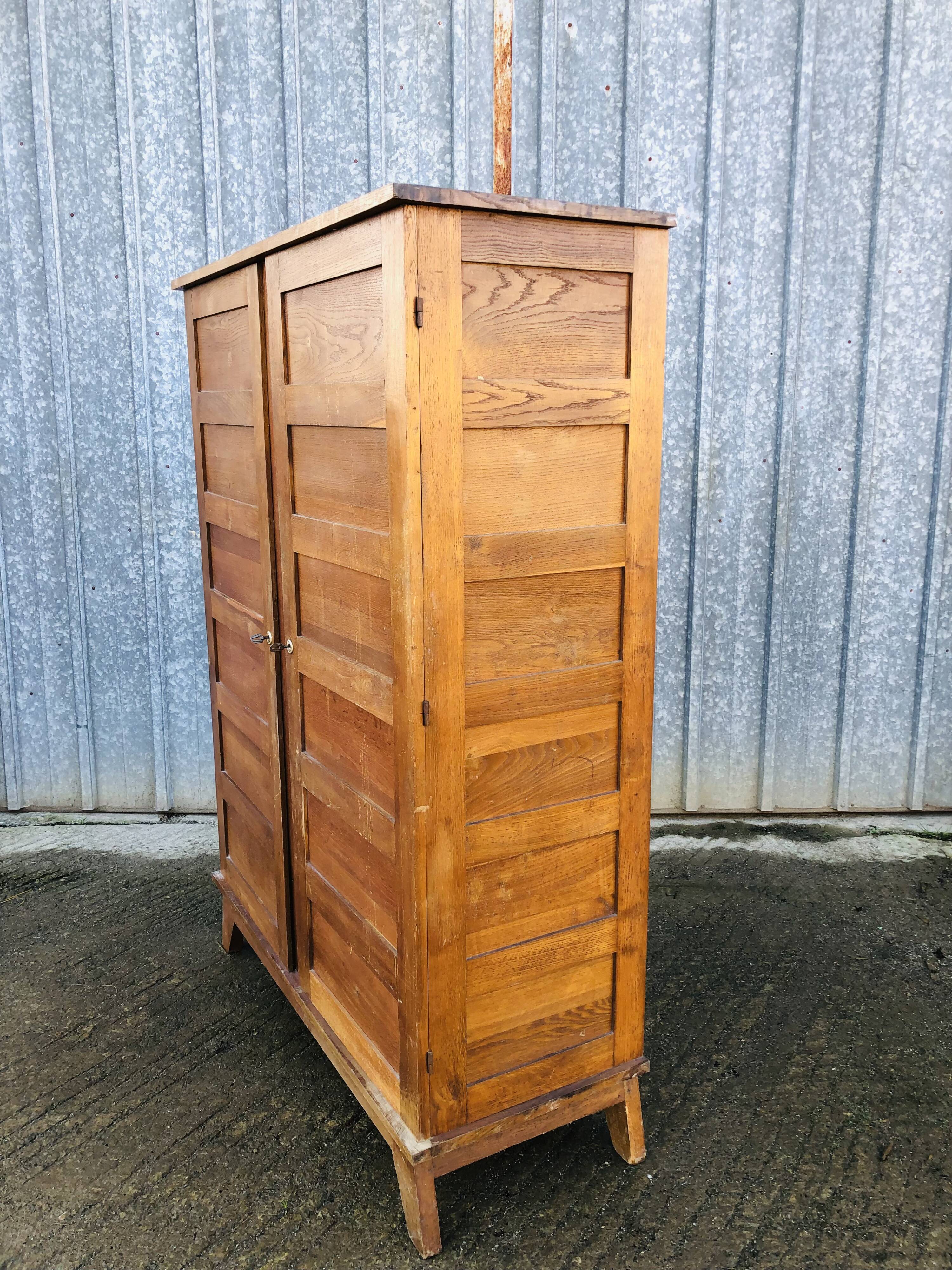 Vintage René Gabriel oak wardrobe with 2 doors from the reconstruction period.