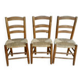Trio of wooden chairs and mulched seat