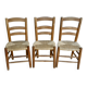Trio of wooden chairs and mulched seat